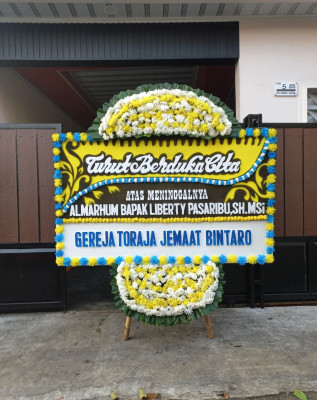 Papan Bunga Duka di Bokoharjo